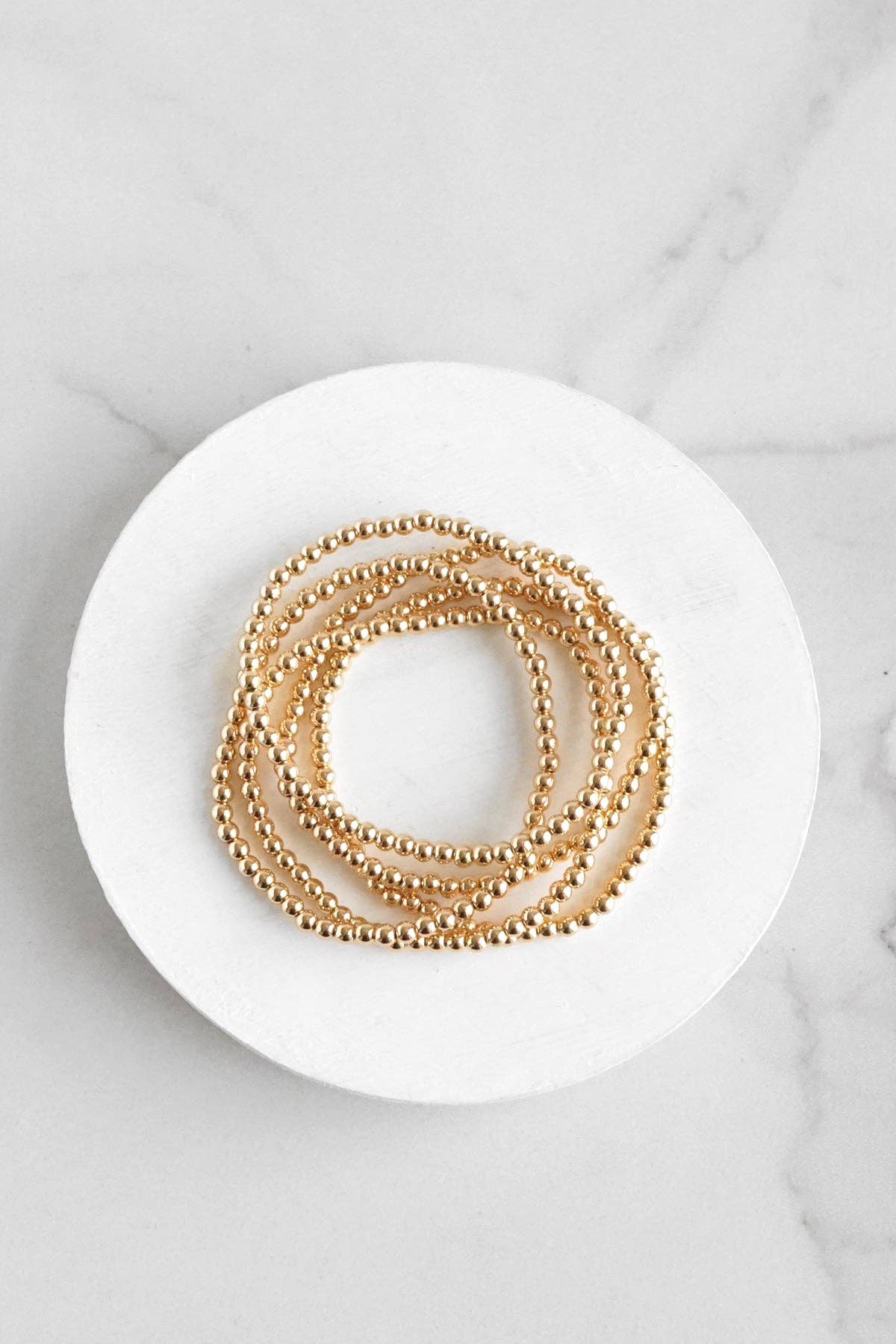 Small ball beads bracelet stack of 5 bracelets Worn Gold
