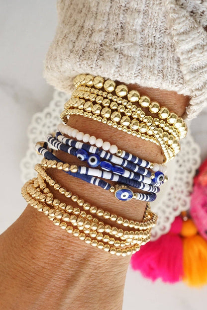 Small ball beads bracelet stack of 5 bracelets Worn Gold