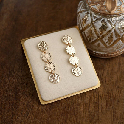 Golden Muse – Four Disc Cascade Earrings